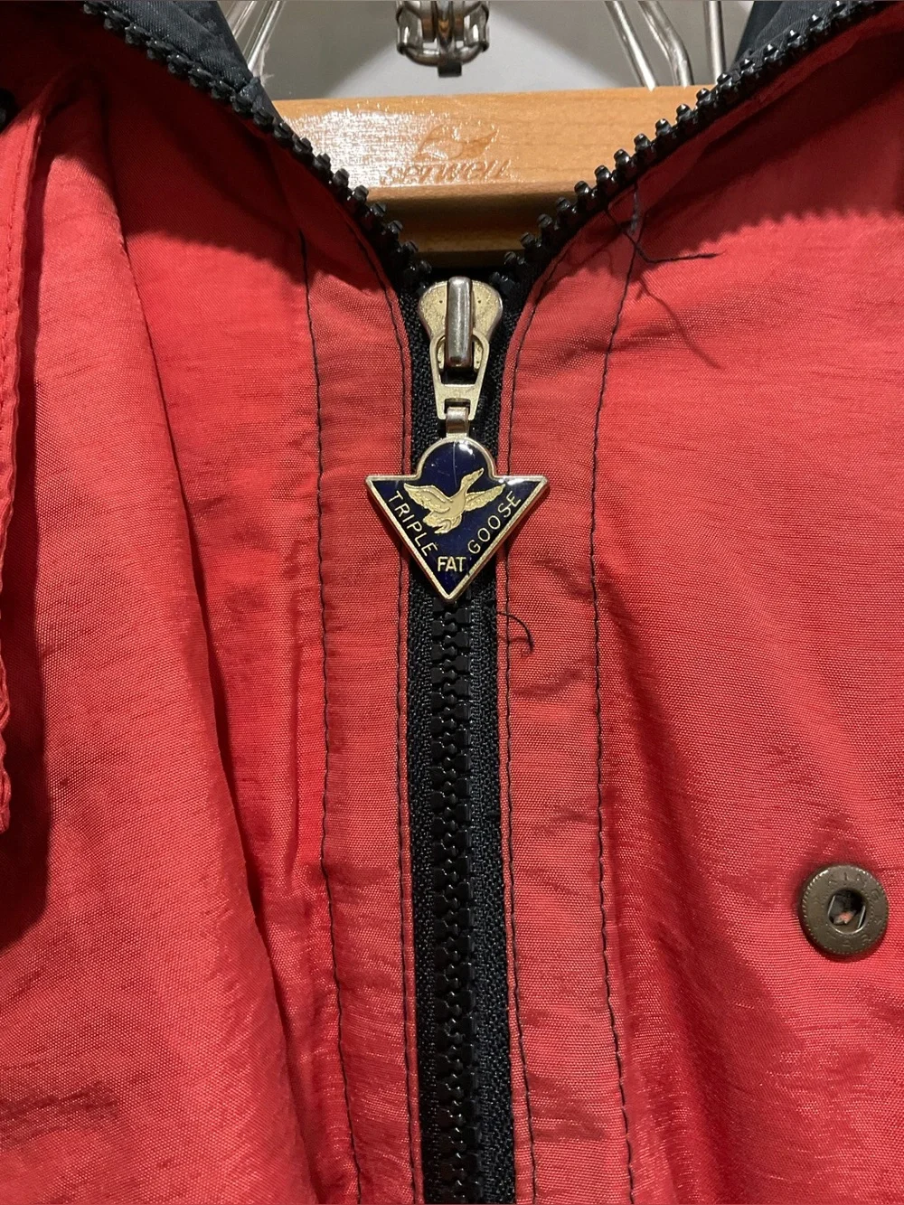 This vintage Triple F.A.T. Goose duck down ski parka features a striking.